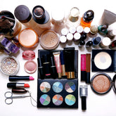 Top-down view of customizable cosmetics including high-pigment eyeshadow palettes, lipsticks, and face powder for beauty influencers' private label brands
